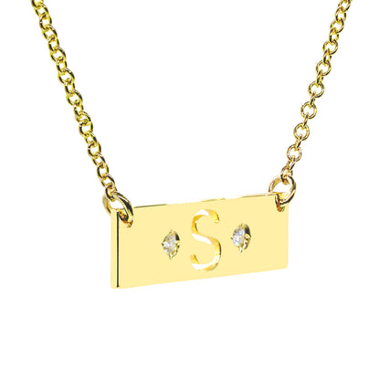 High Polished 14K Gold Bar Punch Out Initial with a Diamond on Sides. | 0.75"
