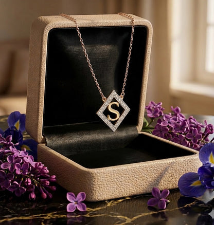 Initial Pendant Framed in Diamonds and Set in 14K Gold